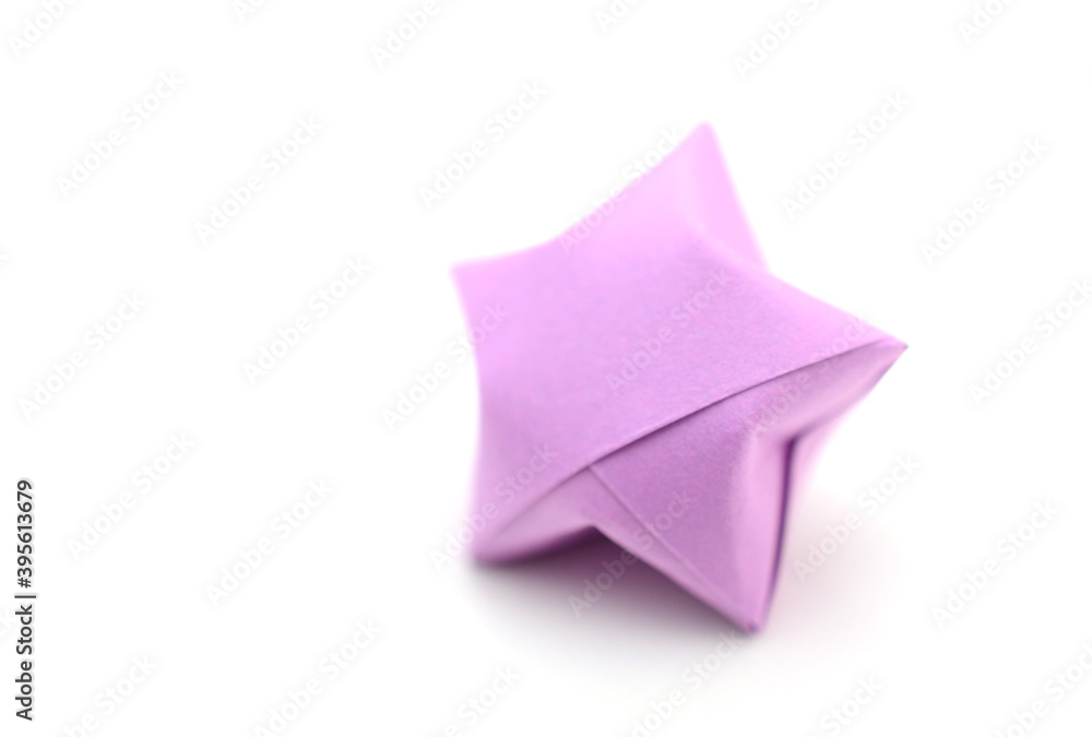 Fototapeta premium A purple lucky origami star