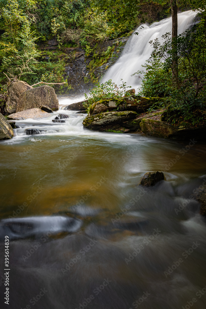 Fototapeta premium Gentle, calm pool rests at the bottom of Glen Cannon Falls in North Carolina