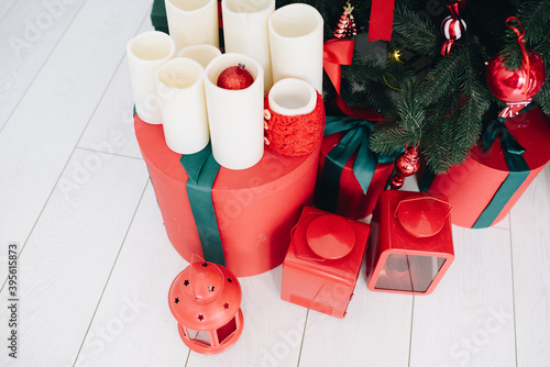 Stylish Christmas Tree surrounded by wrapped presents photo