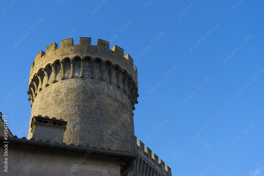 Medieval castle tower with blue sky background