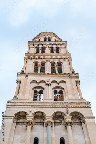 Marble ancient roman architecture in city center of town Split, on cloudy day. Cathedral Saint Domnius and bell tower landmarks, Croatia.
