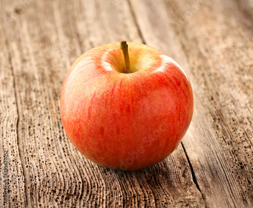 Red apple  on wooden background