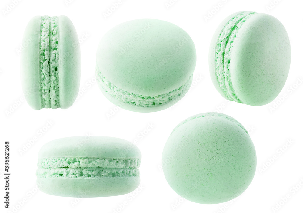 Isolated green macaron collection. Mint or pistachio macaroons at different angles isolated on white background Isolated green macaron collection. Mint or pistachio macaroons at different angles isolated on white background