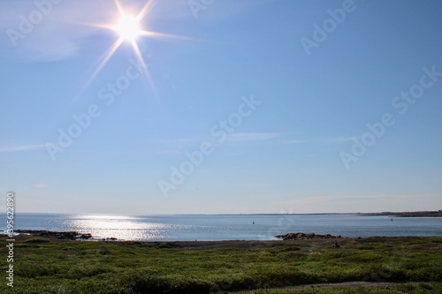 Sun over the sea

Churchill is a town on Hudson Bay in the far north of Manitoba, Canada. It's best known for polar bears that inhabit the area in the fall, and safaris in raised, reinforced tundra ve