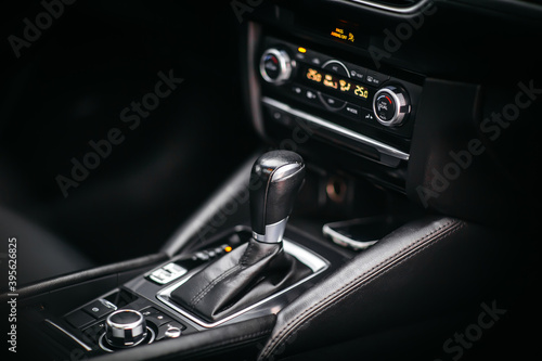 The gear shift lever in the modern car, close up shot