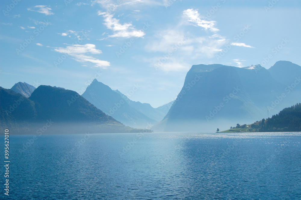 fjord landscape with blue skye and some clouds