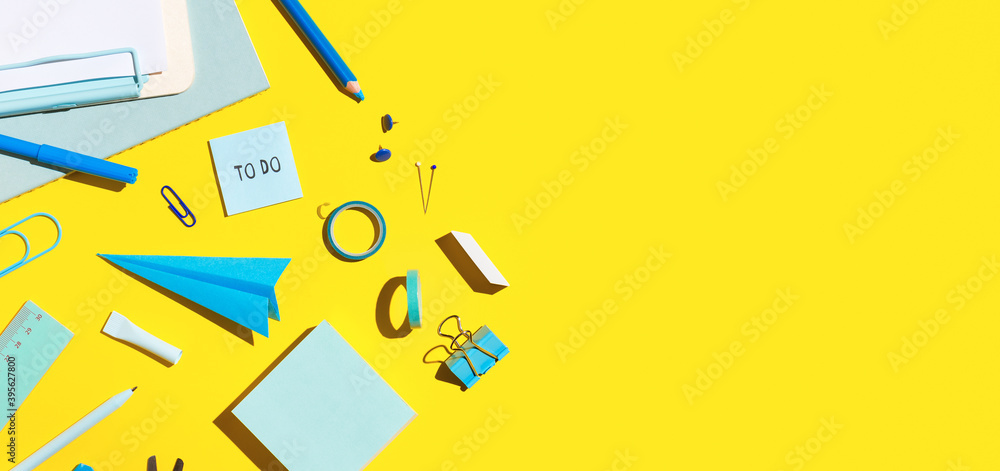 School supplies on yellow background. Back to school.