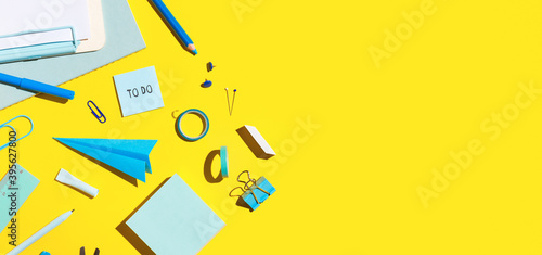 School supplies on yellow background. Back to school.