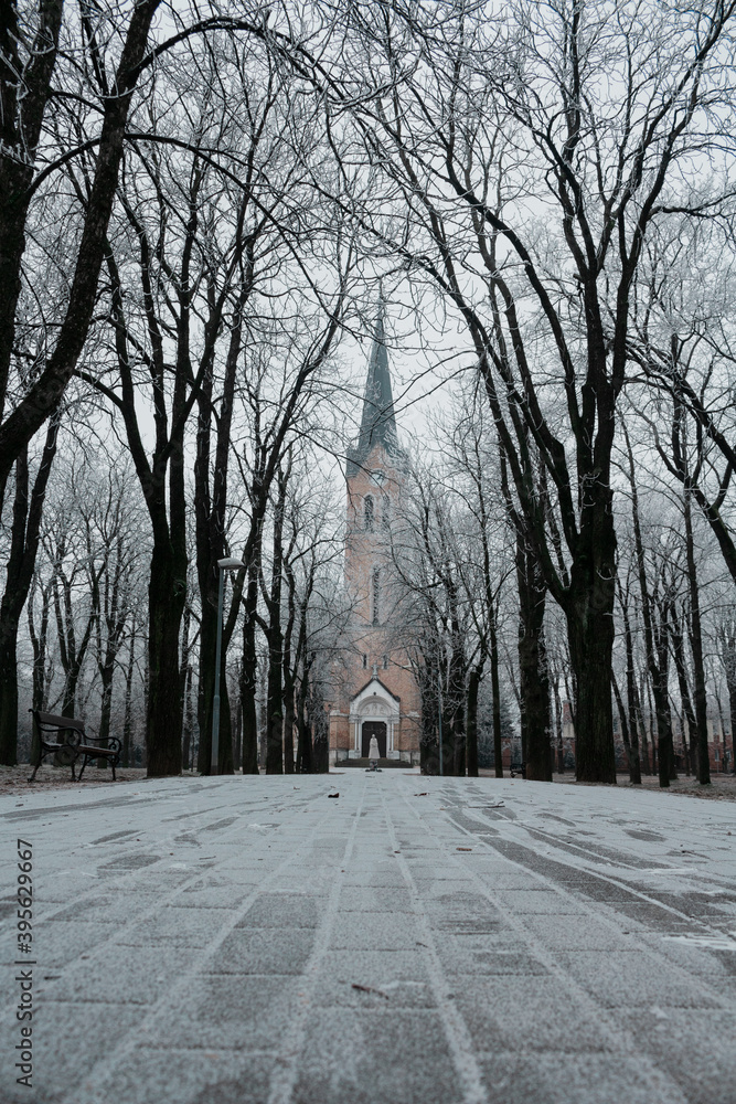 Black and white winter scene with church