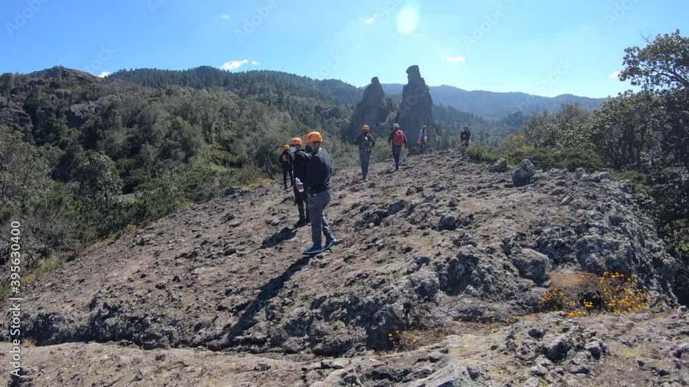 Mineral del Chico- Hidalgo México - November 01, 2020: High angle shot of male rock climbers standing on a mountain Mineral del Chico- Hidalgo México - November 01, 2020: High angle shot of male rock climbers standing on a mountain