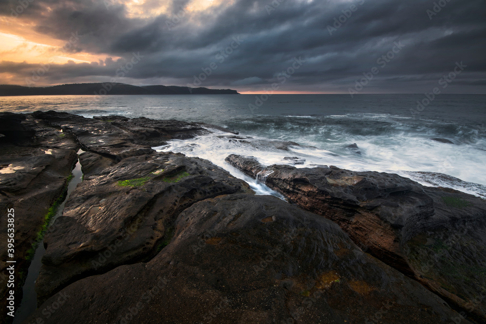 Overcast Sunrise on the rocks between Umina Beach and Pearl Beach on NSW Central Coast