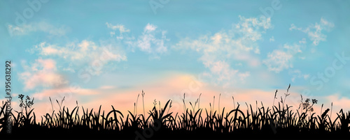 Seamless vector realistic silhouette grass field with sunset sky backdrop. Long length vector horizontal background.