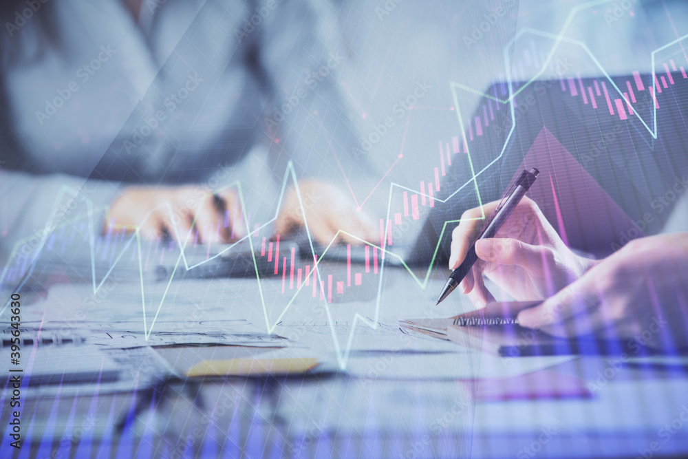 Multi exposure of woman hands typing on computer and forex chart hologram drawing. Stock market analysis concept. Multi exposure of woman hands typing on computer and forex chart hologram drawing. Stock market analysis concept.