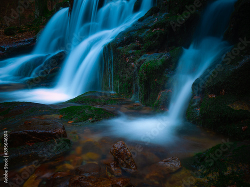 Wild brook with stones and waterfall in Jeseniky mountains, Eastern Europe, Moravia. Clean fresh cold watter, water stream. Long exposure image. .