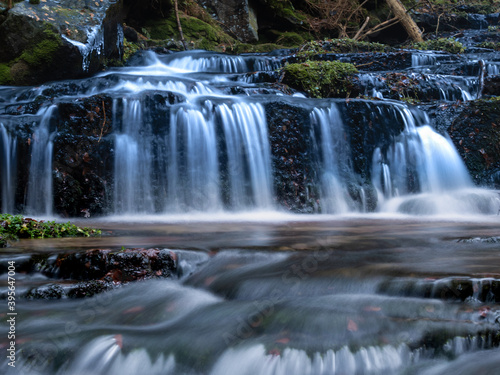 Wild brook with stones and waterfall in Jeseniky mountains  Eastern Europe  Moravia. Clean fresh cold watter  water stream. Long exposure image. .