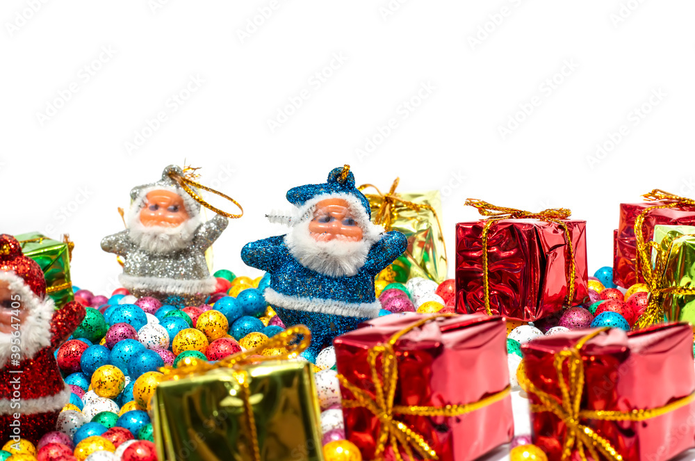 Santa Claus with colorful balls and Gift boxes on white background.