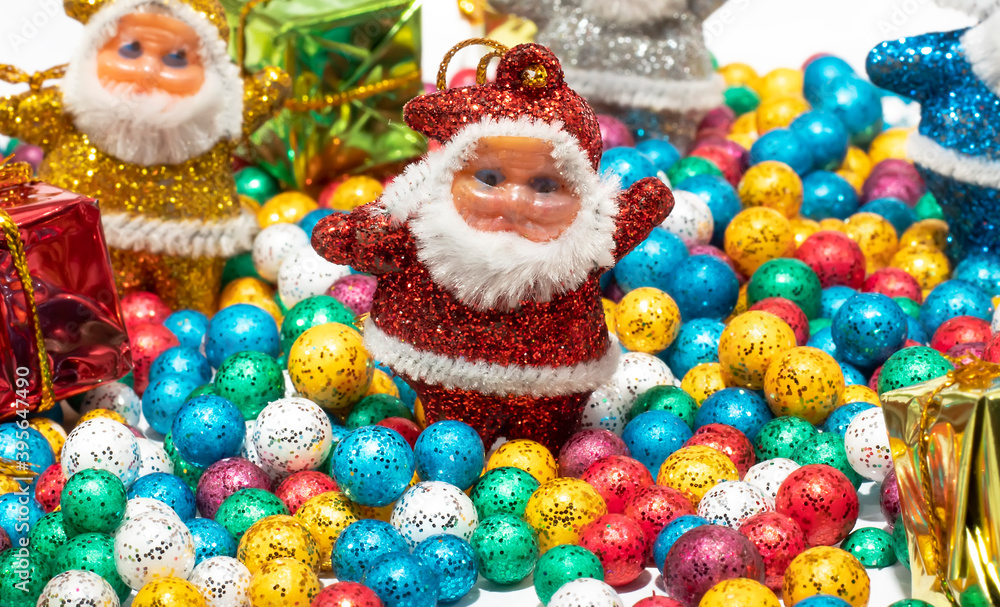 Santa Claus and Colorful balls on white background.
