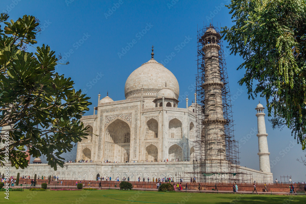 AGRA, INDIA - FEBRUARY 19, 2017: Tourists visit Taj Mahal in Agra, India