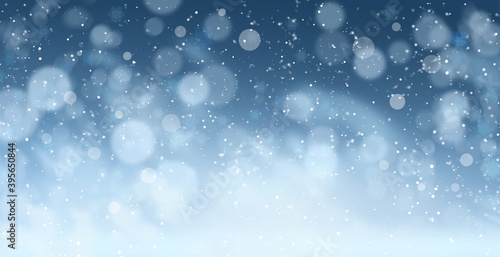 Abstract snowfall on blue background, bokeh effect. Banner design