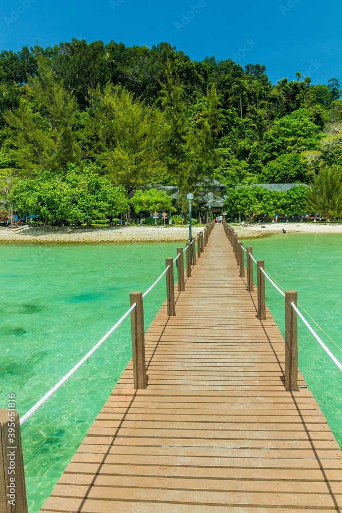 Naklejka premium Wooden pier at Gaya Island in Tunku Abdul Rahman National Park, Sabah, Malaysia
