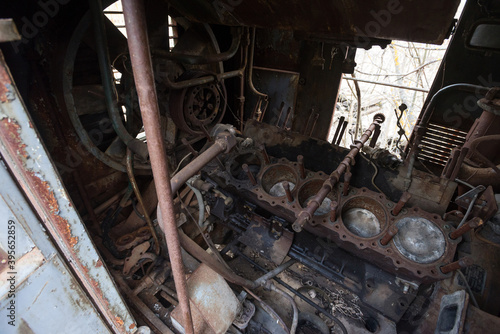 Engine of old radioactive locomotion at abandoned station Yanov near ghost town Pripyat