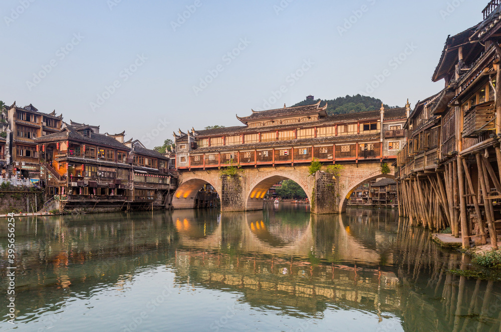 Hong bridge over Tuo river in Fenghuang Ancient Town, Hunan province, China