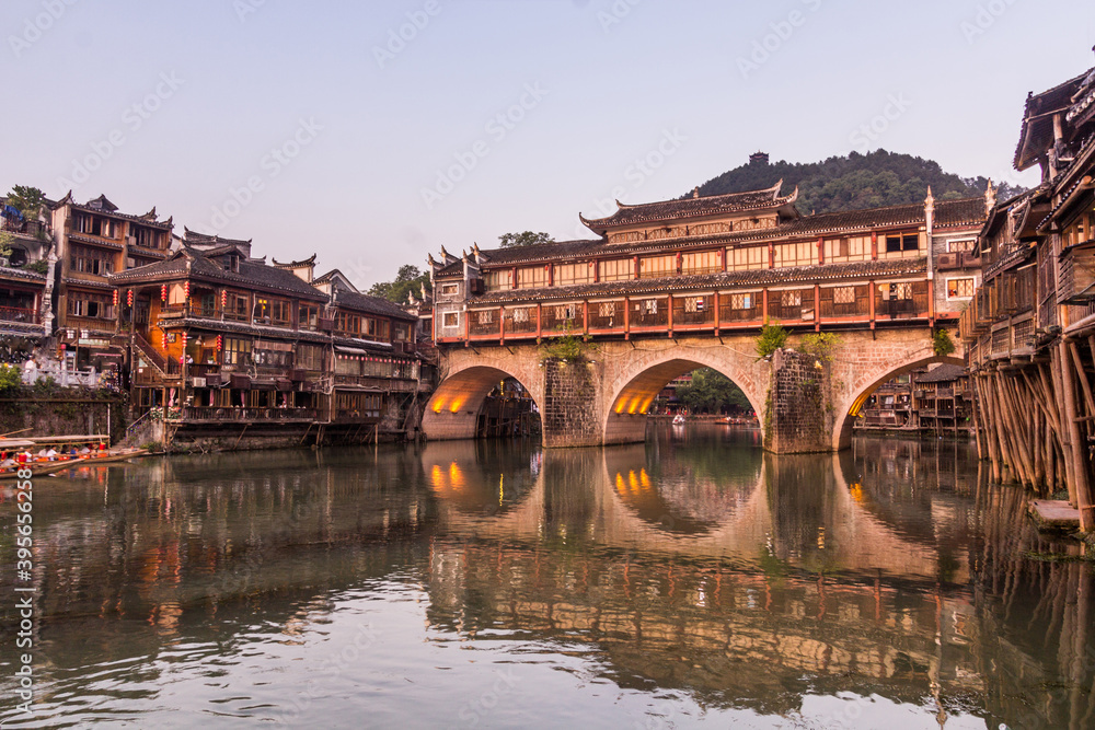 Hong bridge over Tuo river in Fenghuang Ancient Town, Hunan province, China
