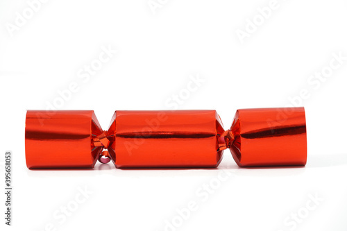 Vászonkép Close-up view of a festive Christmas cracker isolated against a white background