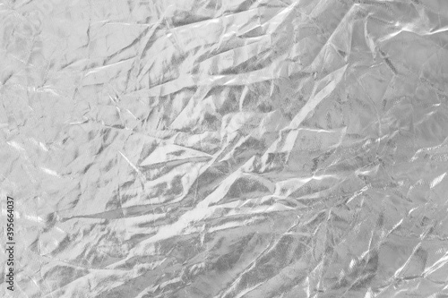 Fototapeta Naklejka Na Ścianę i Meble -  fabric silver wrinkled or crumpled textile texture abstract background.
