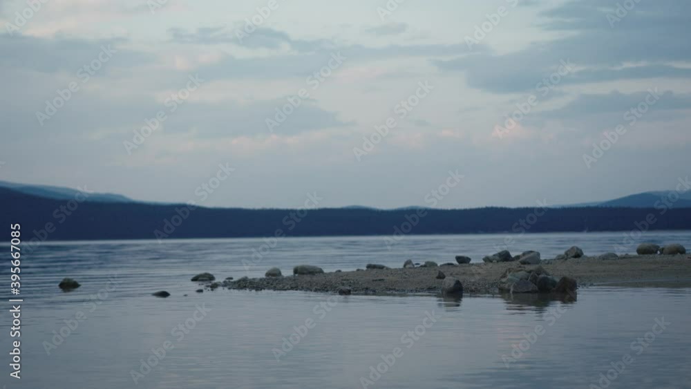Slow motion calm lake in Colorado during blue hour Slow motion calm lake in Colorado during blue hour