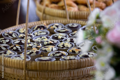 Chocolate muffins placed on the Khantoke. photo