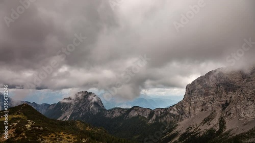 imelapse in the austria alps with dramatic clouds, Nassfeld austria photo