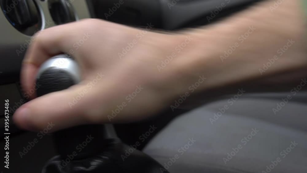 Angry Driver Changing Gears Fiercely with Manual Transmission Gear Stick
