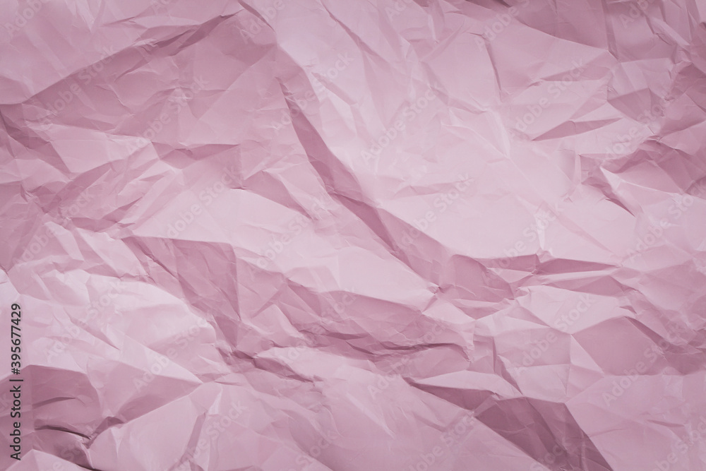 Fototapeta premium pink crumpled paper background, texture for web design screensavers.