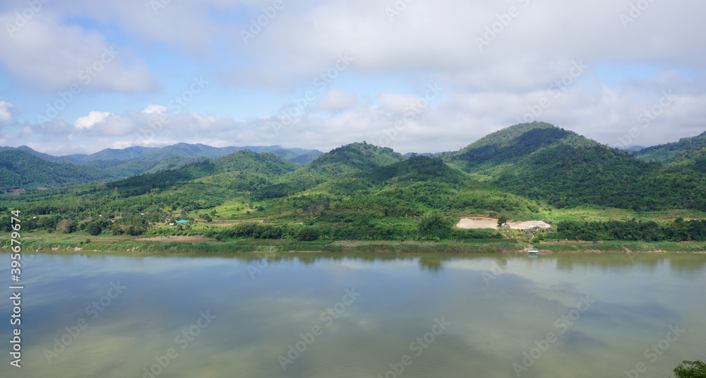 Green Mountain range and Khlong river at the border of Laos from the view point of Chaing Kkhan skywalk Green Mountain range and Khlong river at the border of Laos from the view point of Chaing Kkhan skywalk