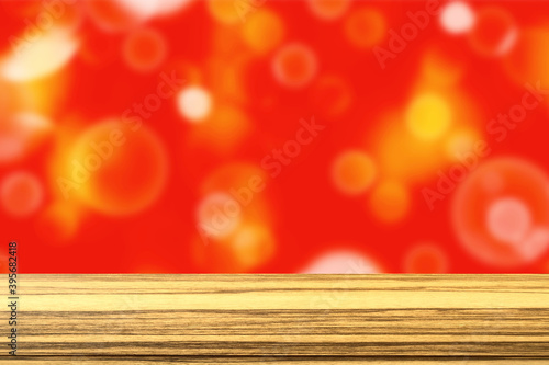 Top wood table on blurred red bokeh background. Montage. Christmas, New Year season.