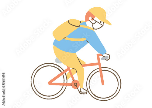 マスクをして自転車に乗る人