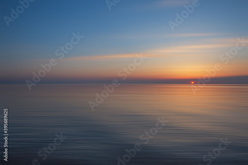 Baltic Sea  with calm waves  and a beautiful sunset