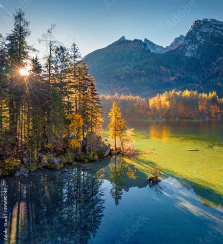 Landscape photography. Stunning autumn view of Hintersee lake with Hochkalter peak on background, Germany, Europe. Astonishing morning view of Bavarian Alps. Beautiful autumn scenery