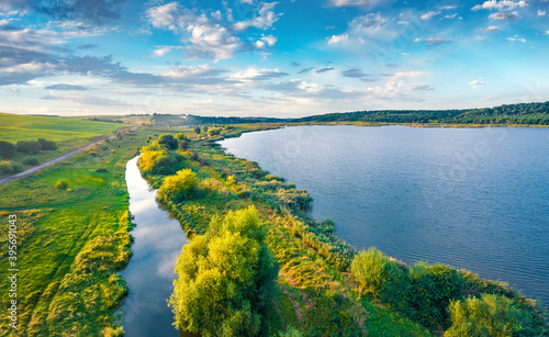 Aerial landscape photography. Beautiful summer scene of Vertelka lake, Ternopil region. Attractivemorning scene from flying drone of Ukrainian countryside. photo