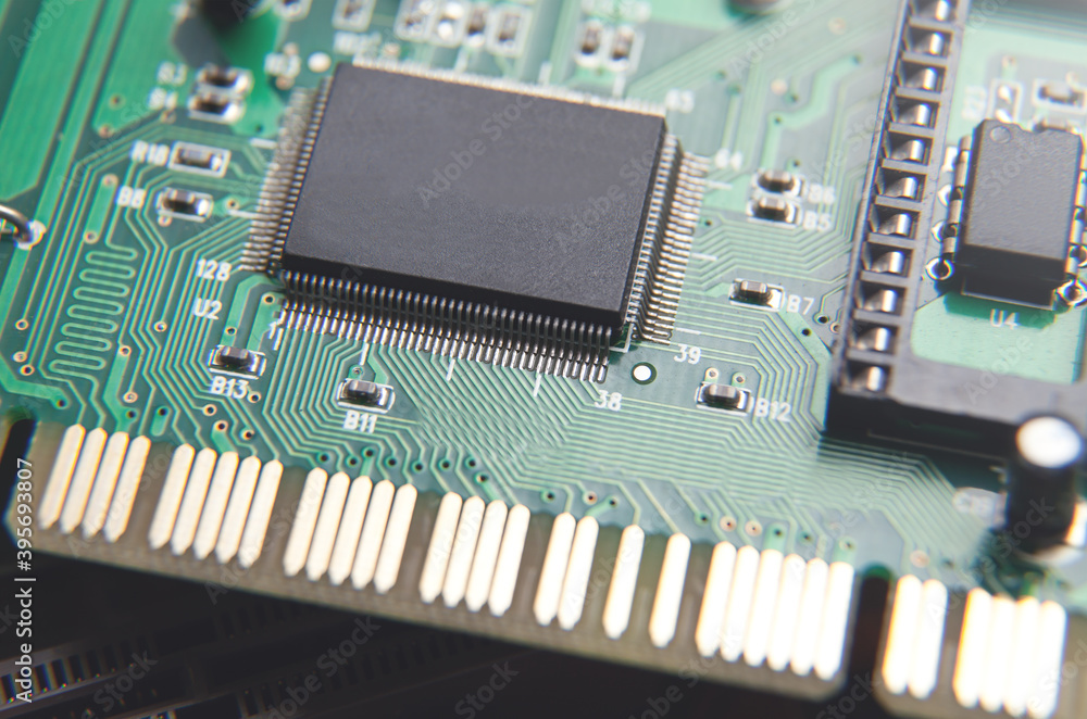 Macro view. Microchip in circuit board. Technology background Macro view. Microchip in circuit board. Technology background