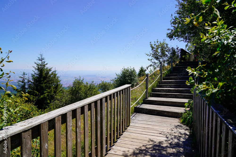 Stairs wood pathway access of the Puy de Dome volcano mountain in center of france