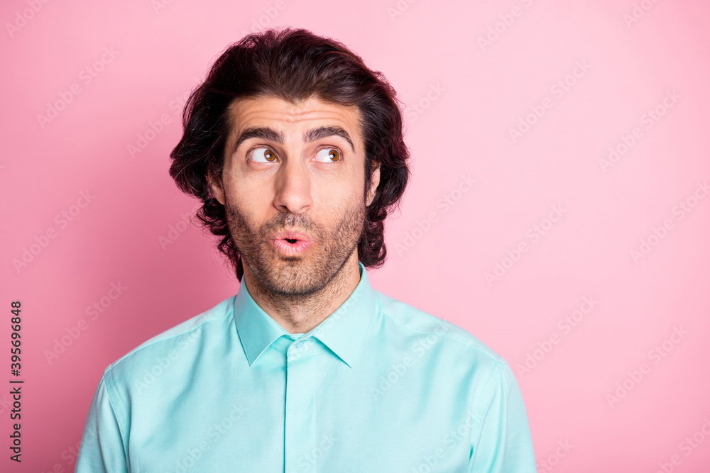 Photo of young handsome dreamy man think curious imagine plan look empty space isolated over pink color background Photo of young handsome dreamy man think curious imagine plan look empty space isolated over pink color background