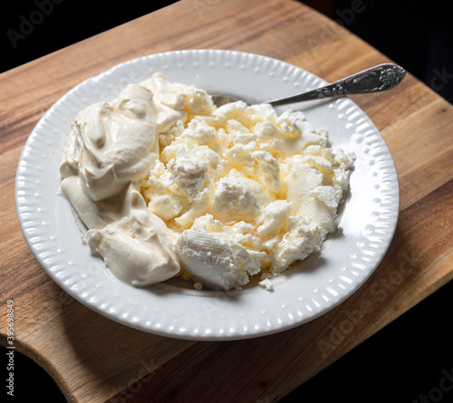 Homemade cottage cheese with sour cream