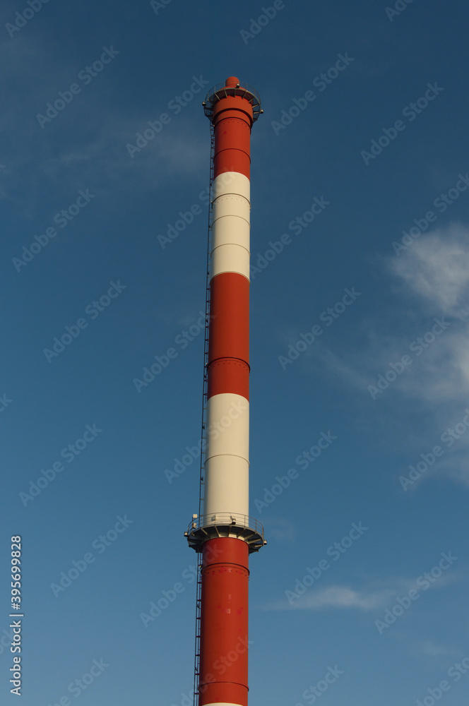 Industrial chimney against the background of blue sky. Bytom Silesia Poland Industrial chimney against the background of blue sky. Bytom Silesia Poland
