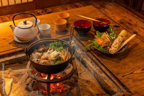 囲炉裏でなべ料理　Chicken hot pot made in Japanese hearth photo