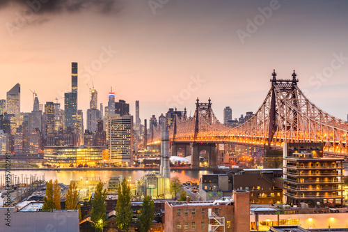 New York, New York, USA Manhattan skyline with the Queensboro Bridge.