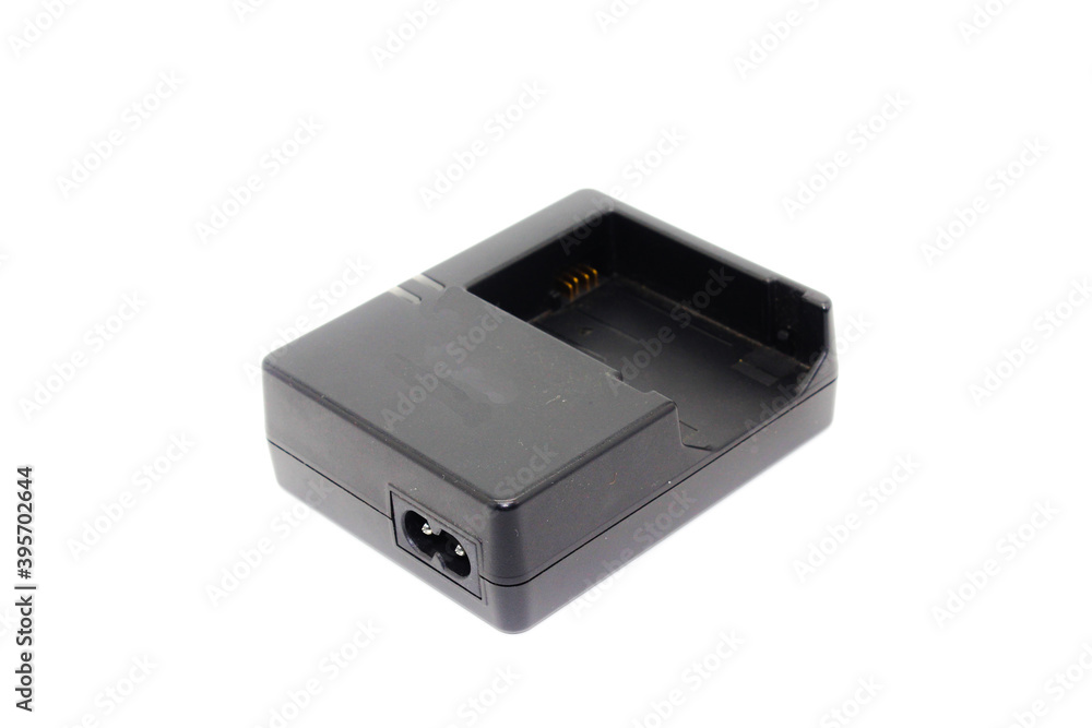 DSLR camera battery charger on white background DSLR camera battery charger on white background