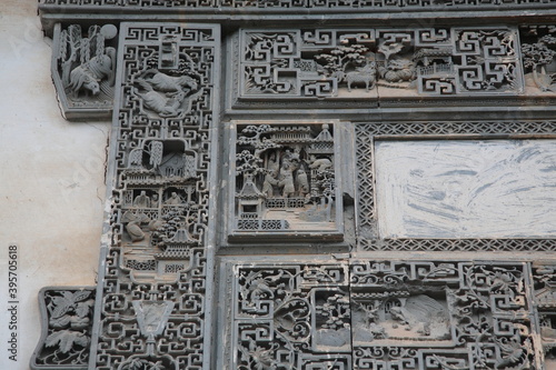 Close up of the decoration detail brick carving on the building entrance wall of Chinese Huizhou Architecture in Wuyuan county, Jiangxi province, China.