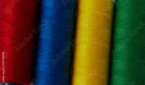 sewing items, needles, thread on white background